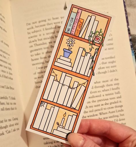 This bookmark has my illustrated design of a bookshelf on it. I This bookmark is perfect for keeping track of what books you have read. You can also colour it in! I recommend using permanent markers such as sharpies or pro markers, but you can use pencils and gel pens too! Add your own pop of colour to truly personalise it the way you want! Bookmark measures approximatley 148mm x 52mm and is printed onto 350gsm silk card. Comes with either squared or rounded corners. Comes as a black and white d Diy Christmas Bookmarks, Easy Bookmarks, Bookshelf Tracker, Bookshelf Bookmark, Bookmarks Design, Bookmark Pen, White Sharpie, Homemade Bookmarks, Pro Markers