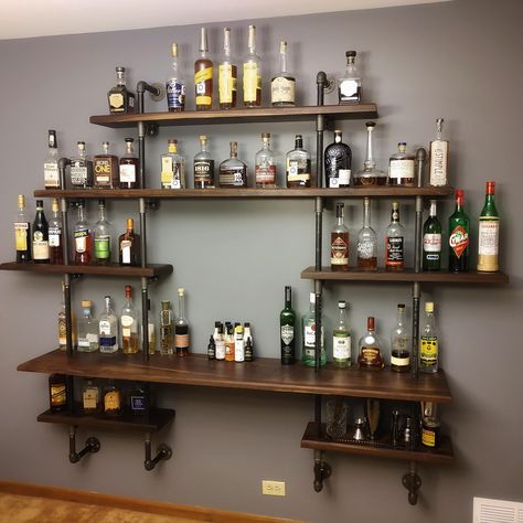 Mini Bar At Home Rustic, Pub Shelves Bar Ideas, Bourbon Man Cave Ideas, Wall Mount Bar Ideas, Cocktail Shelf Ideas, Wood Bar Shelving, Small Whisky Bar, Diy Bourbon Bar, Bar On Wall Ideas