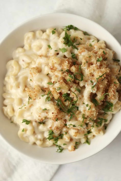 White Cheddar Mac and Cheese is extra cheesy, rich, and easy to make on the stovetop! Start by making an easy white cheese sauce then top the cheesy noodles with crispy Panko Breadcrumbs. White Wine Mac And Cheese, Cpk Macaroni And Cheese, Crockpot White Mac And Cheese Recipe, Best White Cheddar Mac And Cheese, Crockpot White Cheddar Mac And Cheese, Cornflake Mac And Cheese, White Mac N Cheese Recipe, White Cheddar Baked Mac And Cheese, Bechamel Mac And Cheese