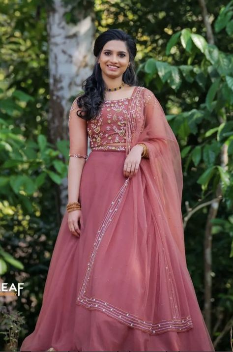 WhatsApp on 9496803123 to customise your handcrafted designer bridal wear with us online. Book your appointment today. We do ship internationally. (Pics for reference) Onion Pink Lehenga Bridal, Lahanga Blouse Design Latest, New Lehenga Designs Simple, Lahanga Design Latest Simple, Reception Dress Bride Indian Lehenga, Kerala Engagement Lehenga, Lahanga Design Latest, Reception Dress Bride Indian, Customised Lehenga