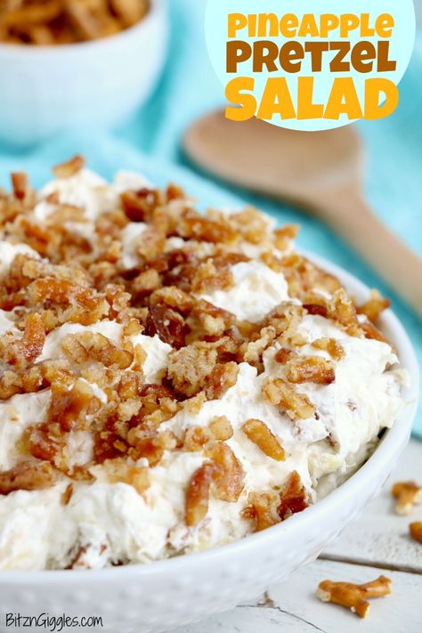 Pineapple Pretzel Salad - This cool, creamy pineapple fluff filled with candied pretzels is the perfect combination of sweet and salty, and can be served as a dessert or sweet side dish! #bitzngiggles #pineapple #pretzel #salad #fluff #dessert #sidedish #summer #potluck Candied Pretzels, Pineapple Pretzel Salad, Pretzel Salad Recipe, Pineapple Fluff, Pineapple Salad, Summer Potluck, Strawberry Pretzel Salad, Pretzel Salad, Sides Recipes