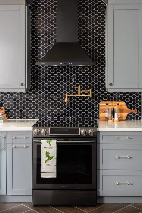 kitchen with black hex tile backsplash and gold pot filler over range Backsplashes With White Cabinets, Kitchen Backsplashes With White Cabinets, Hex Tile Backsplash, Classic Backsplash, Backsplash For White Cabinets, Black Backsplash, Kitchen Diy Makeover, Pot Filler Faucet, Gray Cabinets