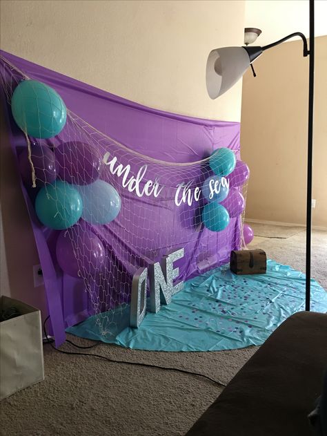 DIY backdrop for cake smash photo shoot. Mermaid themed cake smash Smash Cake Backdrop, Diy Cake Smash Photos, Diy Cake Smash, Cake Backdrop, Mermaid Birthday Party Decorations, Smash Cakes, 1st Birthday Photoshoot, Sea Birthday Party, Mermaid Theme Party