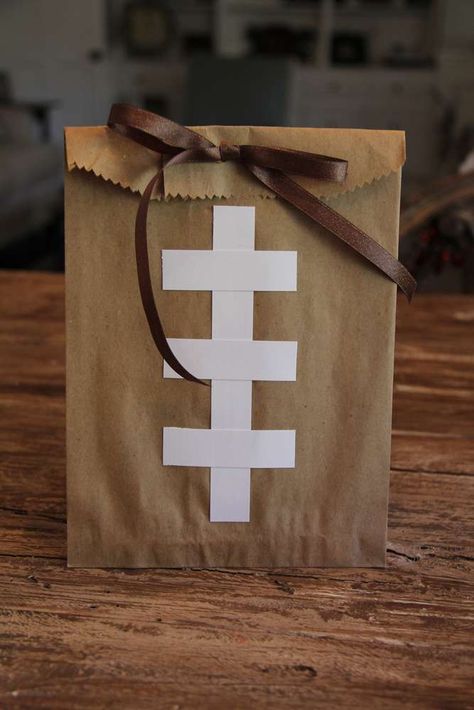 Football party paper bag favors! See more party planning ideas at CatchMyParty.com! Planning Sport, Football Party Favors, Football Banquet, Team Snacks, Football Baby Shower, Football Theme Party, Football Birthday Party, Football Cheer, Super Bowl Party