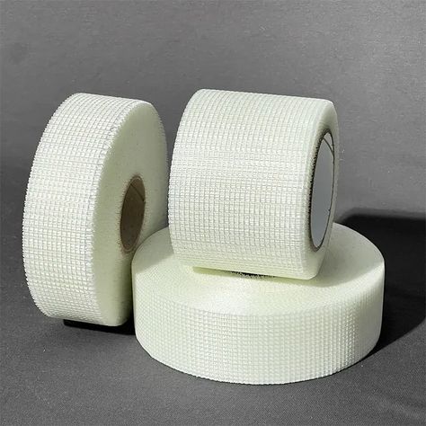 Fiberglass mesh tape is commonly used in construction to reinforce the joints and seams between drywall panels.  Fiberglass mesh tape is self-adhesive, easy to apply, and provides a strong bond.  Fiberglass mesh tape's high tensile strength and tear resistance make it ideal for reinforcing and repairing drywall joints, preventing cracks, and ensuring a smooth surface. 
#Fiberglassmesh #FiberglassMeshTape #Fiberglassmeshtape 
🌍 Repairing Drywall, Plaster Tape, Plaster Repair, Drywall Finishing, Drywall Tape, Drywall Ceiling, Gypsum Board, In Construction, Plaster Walls