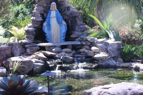 If you already have a water feature on your property, you could make it even more beautiful by adding a grotto. Mary Grotto Garden, Grotto Design Ideas, Mary Grotto, Catholic Garden, Small Water Feature, Marian Garden, Grotto Design, Mary Garden, Blessed Mother Statue