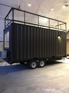 This is the new Vista C Shipping Container Tiny House from ESCAPE. It’s built using a standard ISO 20ft shipping container so it can be shipped anywhere or it can be attached to a special tra… Foundation House, Trailer House, Container Home Designs, 20ft Shipping Container, Container Van, Sno Cones, Used Shipping Containers, Container Bar, Tiny House Builders