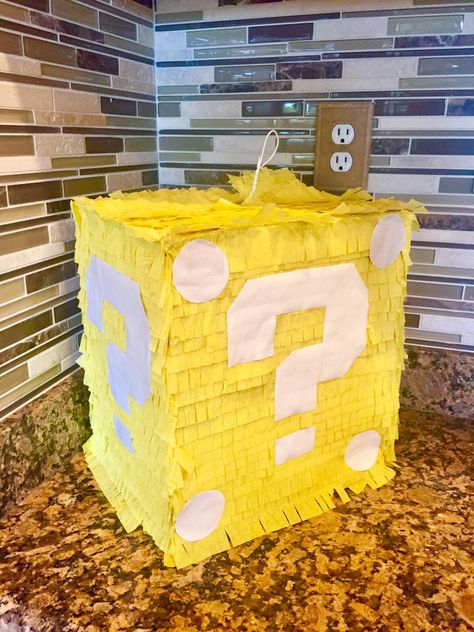 "SUPER MARIO BROS inspired PINATAS/BIRTHDAY DECOR Perfect for your little or big gamer!!  Each Uufilled Pinata is 16-18 inches tall, 4 inches thick except for the question mark block. The question mark block is 12x12x12.  Pinata's are unfilled and have a \"trap door\" left open at the top for candy/toys.  Hook attached at the top for hanging. This is a wack pinata made to last though multiple birthday party guests! I make them tough and they will not break on the first try!  Add a birthday Tee t Mario Birthday Pinata, Mario Birthday Party Pinata, Super Mario Bros Pinata, Mario Brothers Birthday Party Ideas Decoration, Diy Mario Kart Decorations, Mario Bros Pinata, Mario Bday Party Ideas, Super Mario Decorations Diy, Diy Mario Birthday Party