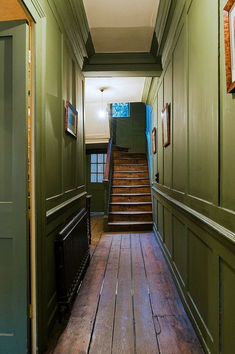 Green wood panelling in a hallway and an old wooden stairway Georgian Panelling Hallway, Georgian Hallway, Georgian Panelling, Ashley Kane, California Life, Wood Panelling, Georgian Interiors, Interior Design Images, Green Wood