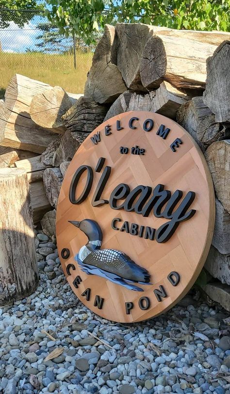 Introducing our beautifully crafted wooden cabin sign with a touch of nature! Made from high-quality wood and carefully designed to add charm to your cabin or vacation home. This sign features a stunning loon design, hand scrolled with precision and each piece is truly unique. Measuring up to 24" inches, our wooden cabin sign is the perfect size to display prominently on the front door or porch of your cabin. The natural wood grain adds a touch of warmth and character to the design, while the lo Cottage Signs Wooden Outdoor, Cabin Welcome Sign, Cottage Signs Wooden, Loon Decor, Wood Cabin Signs, Wood Cabin Decor, Cabin Building, Hunting Cabin Decor, Scandinavian Cabin