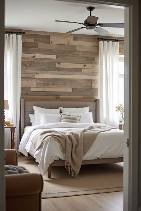 Farmhouse bedroom with reclaimed wood plank accent wall Wood Plank Bedroom Wall, Accent Wall Between Two Windows Bedroom, Unique Accent Wall Ideas, Accent Wall Behind Bed, Wood Accent Wall Bedroom, Bedroom Accent Wall Ideas, Unique Accent Wall, Black Brick Fireplace, Brick Wall Bedroom