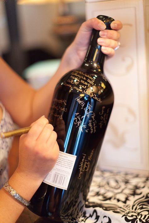 In lieu of a guest book, the couple had guests sign a magnum bottle of wine that they would share on their anniversary. Wine Bottle Guest Book, Batchlorette Party, Bachelorette Party Checklist, Wedding Guest Sign, Wedding Guest Signing, Wine Bottle Centerpieces, Bottle Centerpieces, Bridesmaid Duties, Awesome Bachelorette Party