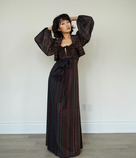 Available for story exchange only: Vintage 1970s black colorful pinstriped maxi dress + bolero set. Bolero has sheer billowy sleeves. Open fit, no closures. Dress has adjustable tie at bust. Attached ties at waist. 100% Polyester. Good vintage condition. #clothesforhearts #vintagefashion #70svintage #sustainablefashion #torontovintage #heartbreakclub #vintageclothingcollector Measurements: BOLERO::: Sleeve length: 21” Sleeve width: 8” Bust: 34” Waist: 26” - 28” Total length: 14” DRESS:: ... Dress Bolero, Billowy Sleeves, Bolero Dress, Pinstripe Dress, Dress Hats, Vintage 1970s, Sustainable Fashion, 1970s, Vintage Outfits