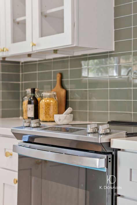 Sage Subway Tile Kitchen, Cream Kitchen Cabinets Green Backsplash, White Cabinets With Green Backsplash, Sage Green Accent Kitchen, Sage Green Subway Tile, White Kitchen Green Backsplash, Green Subway Tile Backsplash, Gold Hardware Kitchen, Green Kitchen Backsplash