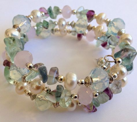 LOVE! this mixture...Rainbow Flourite Chips, 10mm White Opal Faceted Rondelle Crystals, 8mm Pink Opal Faceted Rondelle Crystals, 7-8mm Ivory White Rodelle Fresh Water Pearls, Silver Plated spacer beads. Memory Bracelets, Memory Wire Jewelry, Beaded Memory Wire Bracelets, Memorial Bracelet, Fresh Water Pearls, Memory Wire Bracelets, Water Pearls, Memory Wire, Wire Bracelet