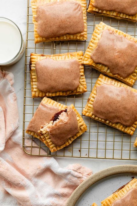 If you enjoy making from-scratch versions of store-bought favorites, you will love these homemade frosted brown sugar cinnamon pop tarts made with homemade pie crust. Like my chocolate pastry tarts recipe, this is a fun baking project you can absolutely handle if you follow my thorough step-by-step instructions. Recipe on sallysbakingaddiction.com Brown Sugar Cinnamon Pop Tarts, Cinnamon Pop Tarts, Brown Sugar Pop Tarts, Poptart Recipe, Sugar Pop, Carlsbad Cravings, Homemade Nutella, Chocolate Pastry, Pop Tart