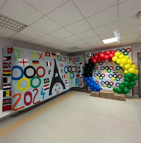 Olympic Podium Diy For Kids, Olympics Balloon Arch, Office Olympics Decorations, Olympic Spirit Week Ideas, Back To School Olympic Theme, Olympic Theme Decorations, Olympic Photo Backdrop, Olympic Photo Booth, Olympic Decorations Classroom