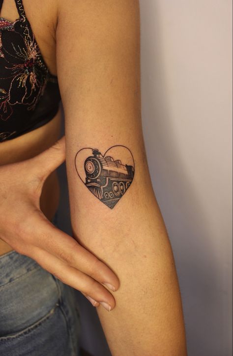 #locomotive #train #treno #tattoo #tattooart #tattooideas #tattoodesign #minimal #minimaltattoo #minimalstyle #minimalismus #hearttattoo #heart Tiny Train Tattoo, Mechanical Engineering Tattoo, Train Tattoos For Women, Locomotive Tattoo, Steering Wheel Tattoo, Train Tattoo, Circular Tattoo, Wheel Tattoo, Stick Tattoo