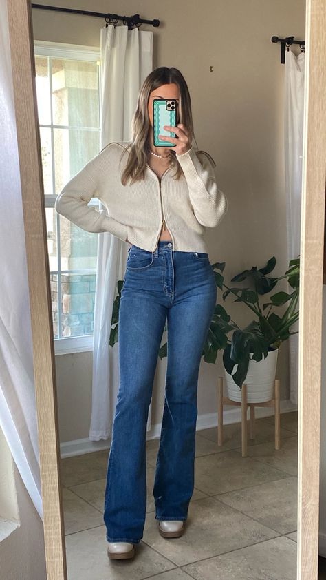 Wearing 24L in the jeans & XS in the sweater. Both very soft and comfortable! Flare jeans, heeled boots, white boots, zip sweater, double zip sweater, Abercrombie jeans Follow my shop @kristinendalton on the @shop.LTK app to shop this post and get my exclusive app-only content! #liketkit #LTKSeasonal #LTKHoliday #LTKCyberweek @shop.ltk https://liketk.it/3V9h9 Flare Jeans Heels, Flared Jeans And Boots, Boot Flare Jeans Outfits, Flare Jeans Outfit 2023, Blue Flare Jeans Outfit Winter, Flare Jeans With Heels, Sweater With Flare Jeans, Flared Jeans Outfit Ideas, Outfits With Flared Jeans