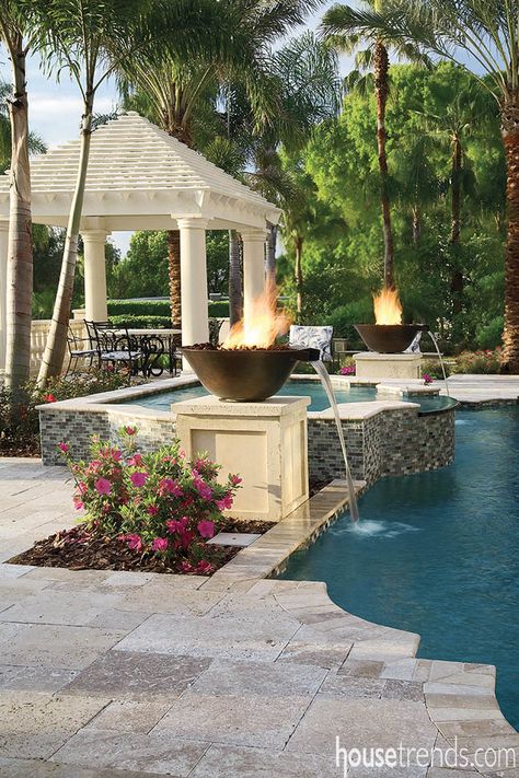 Fire bowls around a swimming pool double as water features Living Pool, Luxury Swimming Pools, Pool Landscape Design, Pool Waterfall, Luxury Pools, Dream Pools, Beautiful Pools, Backyard Pool Designs, Swimming Pools Backyard