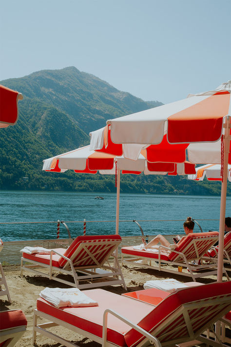 “La dolce vita” awaits at Grand Hotel Tremezzo. This iconic art nouveau beauty graces Lake Como’s western shore, which is unsurprisingly a firm favorite with both celebrities and royalty. Unwind on sun loungers by the lake, explore nearby villages, hike stunning trails, or relax in Villa Carlotta’s manicured gardens—just don’t forget your movie-star shades. La Dolce Vita Aesthetic, Lake Como Summer, Lake Como Aesthetic, Goodbye June, Italian Wedding Aesthetic, Grand Hotel Tremezzo, Italy Como, Villa Carlotta, Aesthetic Lake