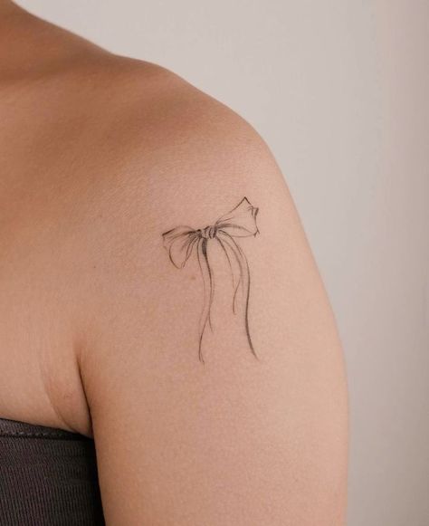 Small Feminine Shoulder Tattoos, Shoulder Bow Tattoo, Bow Shoulder Tattoo, Bow Tattoo Shoulder, Minimal Shoulder Tattoos For Women, Mini Shoulder Tattoo, Heart On Shoulder Tattoo, Fine Line Shoulder Tattoos For Women, Bow Tattoos For Women