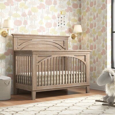 Three Posts™ Baby & Kids For a piece that grows with your child, look no further than a convertible crib. This design is four beds in one, seamlessly transitioning from a crib to a toddler bed to a full bed to a day bed. Crafted from solid wood, it sports crown molding and carved details for a traditional appearance, while slats on all sides keep your toddler safe as they snooze. There are three mattress height settings. Upholstered Crib, Brown Crib, Crib Design, Nursery Planning, Best Crib, Baby Room Inspiration, Convertible Crib, Day Bed, Full Bed