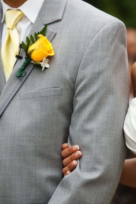 groom's gray suit, yellow tie, and yellow rose boutonniere; something like this for the groomsmen Yellow Rose Boutonniere, Flower Tie, Bright Yellow Wedding, Prom 2020, Gray Groomsmen Suits, Yellow Grey Weddings, Groom Suit Grey, Groomsmen Grey, Rose Boutonniere