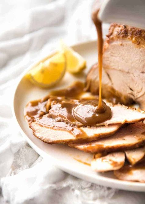 Gravy being poured over Slow Cooker Turkey Breast slices Moist Turkey Breast, Butterball Turkey Breast, Turkey Breast Recipes, Turkey Gravy From Drippings, Moist Turkey, Butterball Turkey, Cooking Turkey Breast, Slow Cooker Turkey Breast, Crockpot Turkey