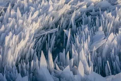 Shards of ice pile up along the South Haven Pier in South Haven, Michigan on March 19, 2019.  (Joel Bissell/Kalamazoo Gazette via AP) via @AOL_Lifestyle Read more: https://www.aol.com/article/weather/2019/03/21/piles-of-jagged-ice-shards-create-surreal-scene-on-lake-michigan/23698005/#slide=7546570#fullscreen?a_dgi=aolshare_pinterest Ice Shards, Ice Aesthetic, Michigan Lake, Surreal Scenes, Frozen Water, Moving Water, Beautiful Notes, Ice Crystals, Frozen Lake