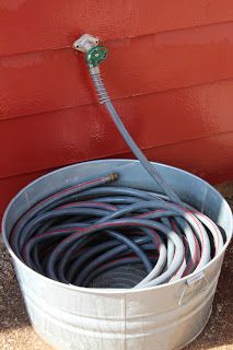 Life in a Little Red Farmhouse: Galvanized Bucket for water hose Fall Organization, Red Farmhouse, Hose Storage, Stock Tank, Clever Diy, Diy Backyard, Lawn And Garden, Tips Tricks, Outdoor Projects