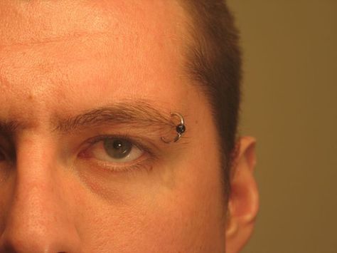 Great captive bead eyebrow piercing from an article on the importance of sterilization of piercing tools at Studex Asia Eyebrow Piercing Men, Triple Forward Helix Piercing, Piercing Men, Heart Nose Rings, Eyebrow Products, Thick Gold Ring, Men's Piercings, New Piercing, Gold Wave Ring