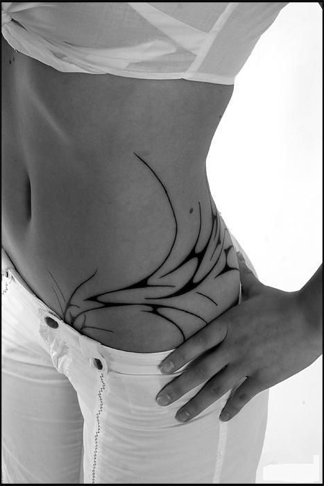 I'm getting mine here, but it'll go up my side more. (This tattoo is sweet! And simple too. Love it.) Hip Tattoos For Girls, Girl Flower Tattoos, Flower Hip Tattoos, Waist Tattoos, Hip Tattoos Women, Hawaiian Tattoo, Side Tattoos, Hip Tattoo, Skull Tattoos