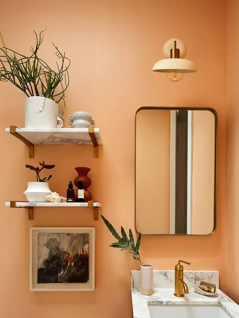 Pantone's Color of the Year 2024: A Hue of Healing - Decoholic Orange Bathroom Aesthetic, Pastel Orange Bathroom, Orange And White Bathroom, Bathroom Vanity Lights Over Mirror, Vanity Lights Over Mirror, Orange Bathrooms Designs, Glass Partition Designs, Bathroom Wall Colors, Bathroom 2024