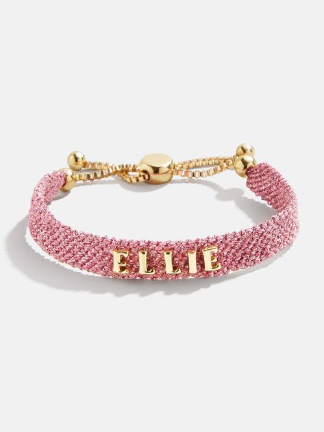 Our Metallic Custom Woven Friendship Bracelet offers an elevated take on the ever-loved friendship bracelet trend. The pink mesh band creates a metallic backdrop for graphic gold letter beads, which are sewn on by hand for this bracelet. Pick up one for you and a friend, then choose to add your name, initials, or a favorite phrase. See our Letter Key for all options available. Jewelry Real Gold, Cute Sentimental Gifts For Best Friend, Evry Jewels Bracelet Stack, Preppy Stuff Bracelets, Preppy Gold Bracelet Stack, Gifts To Get Best Friend, Giftful Wishlist, Good Quality Jewelry, Big And Little Sorority Gifts