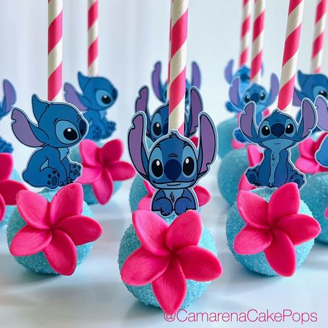 🌺💙💕Stitch Theme Pops💕💙🌺 #stitch #stitchtheme #stitchpops #liloandstitch #liloandstitchbirthday #stitchparty #lilostitch #stitch #liloandstitchcake #liloandstitchparty #decoratedcupcakes #cupcakeart #cupcakesdecorados #cakepopping #cakepoppin #cakesicles #cakepopsicles #cakepopart #stitchtheme #bdaycupcakes #bdaytheme #stitchcake #bdayideas #cakepops #lilostitch #tropicalparty #tropicaltheme #hawaiiantheme #hawaiianparty #pops #cakepop Stitch Macarons, Stitch And Angel Party Decorations, Stitch Cakepops, Lilo And Stitch Cake Pops, Stitch Birthday Cookies, Stitch Cake Pops, Lilo And Stitch Food Ideas, Stitch Birthday Ideas, Stitch Bday