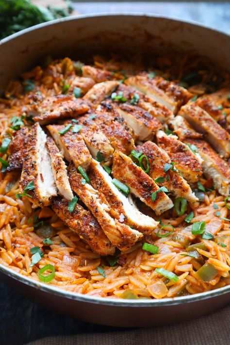 skillet with cajun chicken on top of orzo topped with green onion Cajun Orzo, Cajun Chicken Orzo, Tender Juicy Chicken Breast, Orzo Recipes Side, Easy Cajun Chicken, Juicy Chicken Breast, Easy Cajun, Orzo Recipes, Chicken Orzo