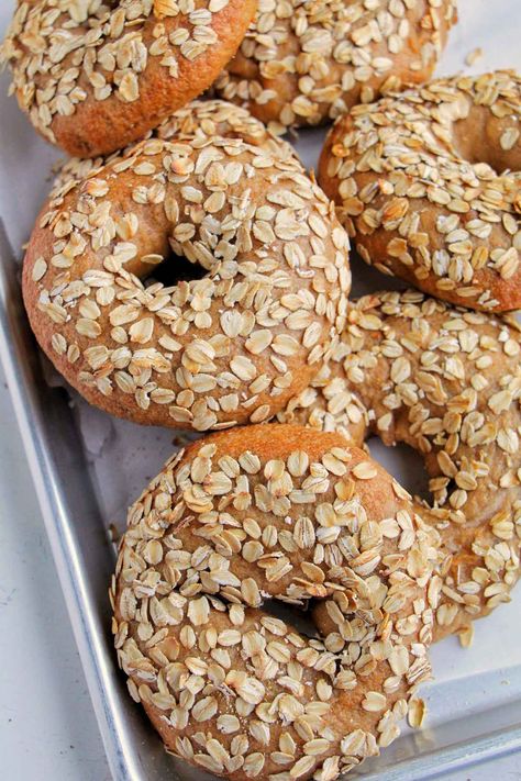 I'm obsessed with this oatmeal bagel recipe! It's a great healthy breakfast with some whole wheat flour for my family. These bagels are topped with oats and the dough is made with a blend of bread flour and whole wheat flour. These bagels are made overnight and they are a great healthy meal prep item to make for weekday breakfast. I like using them for breakfast sandwiches or eating them all on their own with some jam. How To Make Bagels, Bagel Recipes, Whole Wheat Bagel, Bagel Toppings, Weekday Breakfast, Homemade Bagels, Bagel Recipe, Breakfast Sandwiches, Pizza Stone