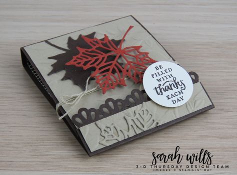 This is a Matchbook style treat holder - inside is a Ghirardelli chocolate square for a sweet treat! Full info plus free Project Sheet on my blog Sarah Wills Sarah's Ink Spot #sarahwills #sarahsinkspot #stampinup #matchbook #ghirardelli #seasonallayersthinlits #layeringleaves #falltreat #teachergift #teachertreat #projectsheet #3D #diecutleaves #papercraft #handmade #stampinupdemonstrator Ghirardelli Chocolate Squares, Christmas Treats Holders, Teacher Treats, Autumn Cards, Carte Halloween, Ghirardelli Chocolate, Thanksgiving Treats, Treat Holders, Chocolate Squares