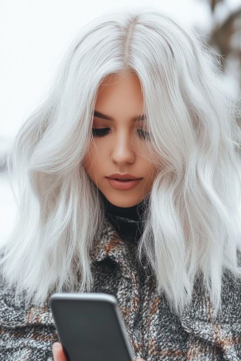 winter hair color, cozy hair, seasonal hair style Ice Hair Color, Silvery Blonde Hair, Silvery Blonde, Ice Hair, Winter Hair Color Ideas, Rich Brunette, Ice Blonde, Blonde Waves, Wavy Style