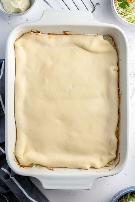 This Runza casserole is a classic Nebraska treat! It's packed with ground beef, cabbage, and cheese, a Cabbage And Cheese, Casserole With Biscuits, Runza Casserole, Ground Beef Cabbage, Crescent Roll Crust, Leftover Casserole, Beef Cabbage, Cheese Crescent Rolls, Taco Casserole