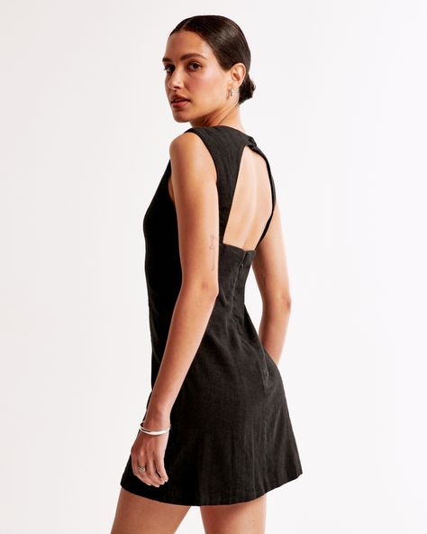 Flattering mini dress in our soft linen-blend fabric and body-skimming silhouette, featuring on-trend shell neckline, flattering seaming details and open-back detail with button closure. Cute Jumpsuits, Chic Black Dress, Linen Mini Dress, Grad Dresses, American Clothing, Black Back, 70 Dress, Abercrombie And Fitch, Linen Women