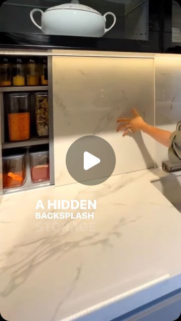 Ar. Aashi Jain on Instagram: "✨ Say goodbye to countertop clutter with this genius hidden backsplash storage! Taking up just 7-8 inches of space, it’s perfect for stashing all your spices neatly and within reach. 🌿 Customize it in wood or tile to match your kitchen’s vibe. The smooth pull-out design makes cooking a breeze! 👩‍🍳 Maximize space near your Ota and keep things tidy. 
💡 Save this idea for your next kitchen upgrade! 🔥

(Home innovation, storage space, storage ideas, kitchen ideas, kitchen hacks, beautiful storage, kitchen interior, kitchen innovation, renovation)" Hidden Kitchen Countertop, Hidden Backsplash Storage, Kitchen Ota Design, Tilt Out Cabinet, Backsplash Storage, Space Storage Ideas, Dresser Alternative, Small Kitchen Counter, Cubicle Organization