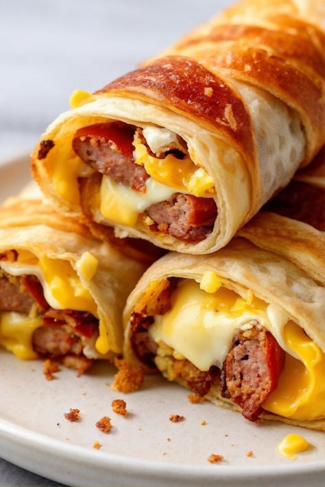 Sausage, Egg and Cheese Breakfast Roll-Ups Yummy Egg Breakfast Ideas, Cheese And Onion Sausage Rolls, Breakfast Rolls, Delicacy Food, Yummy Comfort Food, Delicious Snacks Recipes, Sausage Breakfast, Breakfast Brunch Recipes, Breakfast Recipes Easy