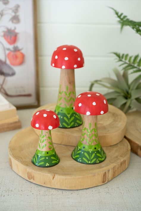 Three painted wooden mushrooms sprout from the ground. Arrange these pieces together or separately or group them with other fungi decor. These toadstools rule.

Set Of 3 Painted Wooden Mushrooms NBA2447 | Kalalou Cottage Core Inspired Home Decor Accents Fungi Decor, Painted Wooden Mushrooms, Painted Mushrooms, Wooden Mushrooms, Shop Displays, Blue Chinoiserie, Food Candles, Table Runner And Placemats, Red Cap