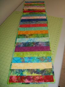 Sew Cook and Travel: Quilt As You Go Table Runner With Jelly Roll Strips Dark Wood Dining Room Table, Jelly Roll Quilting, Dark Wood Dining Room, Diy Jelly, Bright Table, Quilted Table Runners Christmas, Patchwork Quilting Designs, Wood Dining Room Table, Jelly Roll Quilt Patterns