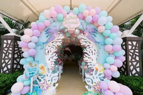 Mermaid Arch from a Majestic Mermaid Under the Sea Party on Kara's Party Ideas | KarasPartyIdeas.com (6) Mermaid Under The Sea Party, Mermaid Party Ideas, Sea Treasure, Balloon Ceiling, Mythical Beings, Ocean Birthday Party, Mermaid Fin, Mermaid Birthday Party Decorations, Mermaid Theme Birthday Party