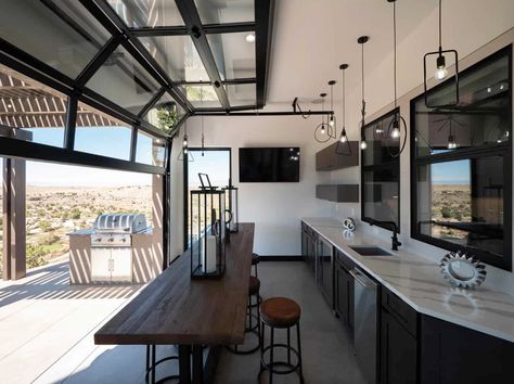 Double Island Kitchen, Modern Ranch House, Kitchen Ikea, Indoor Outdoor Kitchen, Award Winning Kitchen, Glass Garage Door, Outdoor Kitchen Ideas, Entertaining Space, Outdoor Kitchen Patio