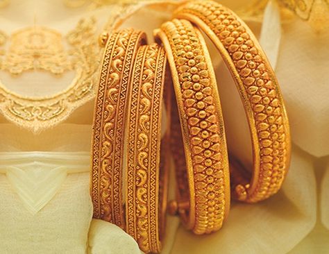 Bangles are beautiful accessories that you can try on with any attire. It just takes the right choice to make. Take a look at these latest gold bangle designs in 20 grams.