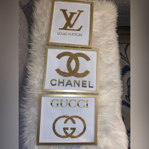 New Gold Home Decor Designer Frames Louis Vuitton, Gucci, And Chanel Logos Diy Designer Decor, Cute Louis Vuitton Wallpaper, Baddie Apartment Decor, Diy Chanel Decor Dollar Stores, Chanel Bathroom Decor Ideas, Chanel Room Decor, Gucci Home Decor, Chanel Bedroom Ideas, Workout Room Ideas